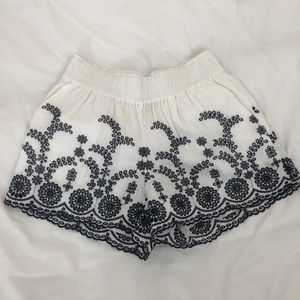 Summer time white shorts with blue embroidery!